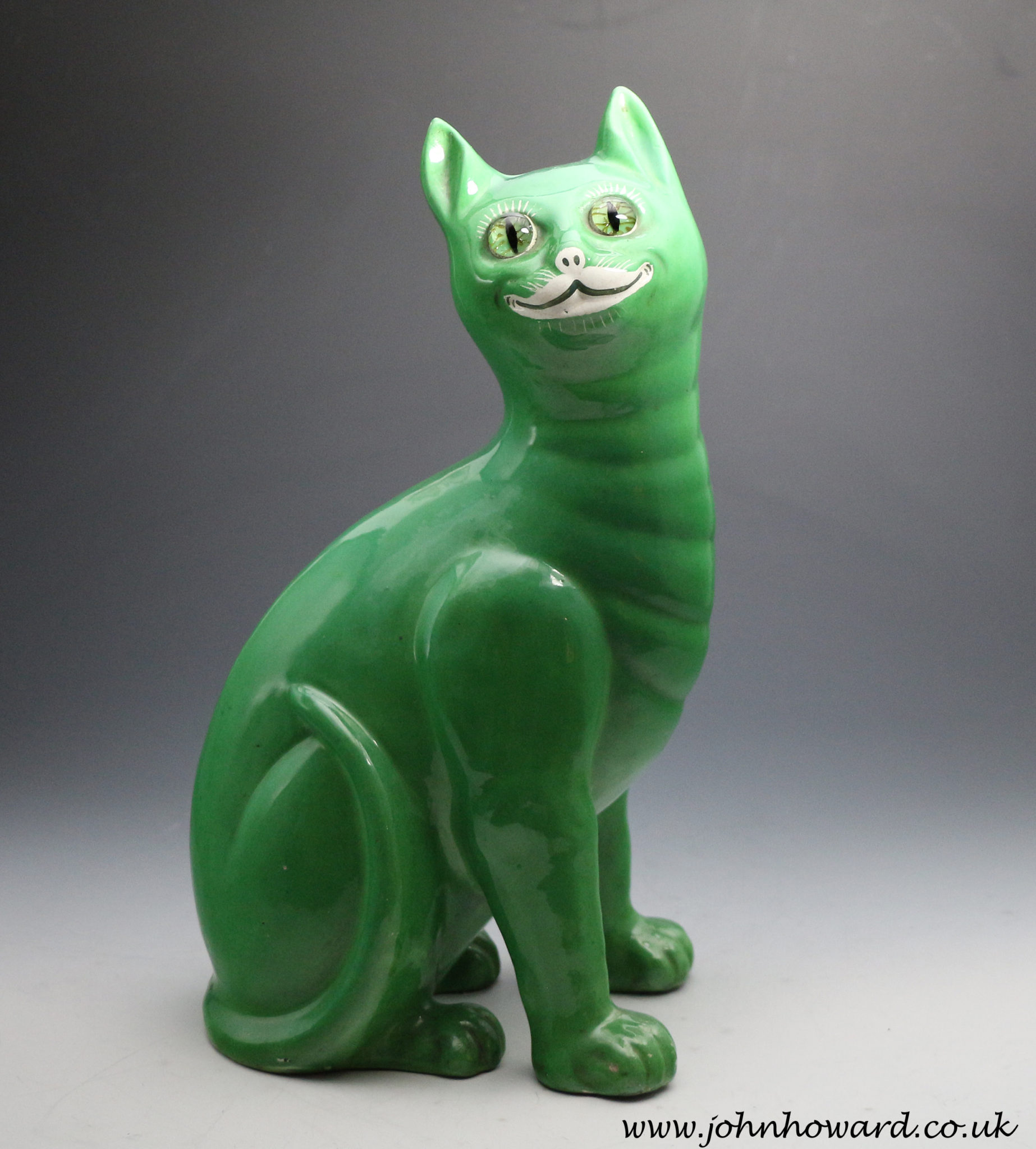 Staffordshire pottery figure of a green comical cat in the Galle manner ...