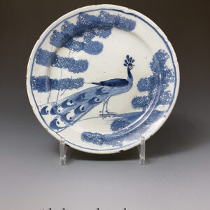 Bristol delftware blue and white  plate with peacock and trees from the farmyard series  mid18thc England