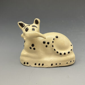 Early English slipware figure of a cat holding a mouse early 18th century