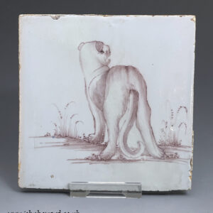 English delftware tile with hand painted image of a lioness in manganese, 18th century  probably Bristol.