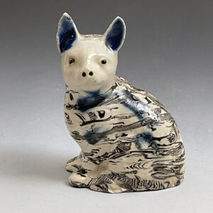 Staffordshire saltglaze agateware figure of a seated cat mid 18th century.