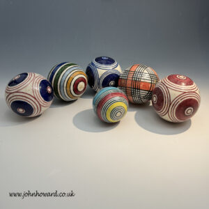 Six pottery carpet balls Scottish or North East England mid 19th century