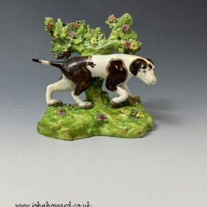 Staffordshire pottery pearlware bocage figure of a Pointer sporting dog c1820