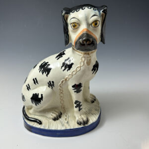 Staffordshire pottery  large sized figure of hound in underglaze black circa 1850