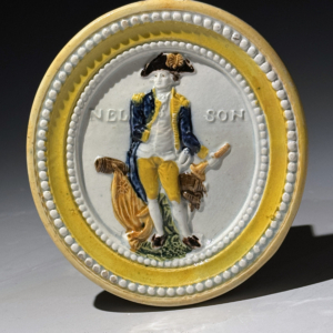 Oval prattware English pottery plaque with named portrait NELSON c1800
