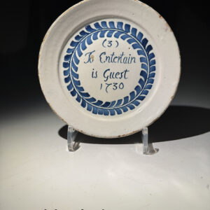 An English delftware blue and white Merryman plate probably London, dated 1720